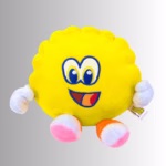 Image Description: A promotional product hero image of a soft yellow Scrub Daddy plush toy set against a neutral gradient background, featuring embroidered blue-and-white eyes, a smiling mouth, white-gloved hands, and pink-and-white feet.