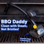 Image Description: A product action infographic featuring bold blue header text that reads "BBQ Daddy Clean with Steam, Not Bristles!" over a dark grill background, highlighting the tool's ArmorTec Steel and FlexTexture materials used for safe, bristle-free cleaning on grill grates.