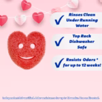 Image Description: A promotional Valentine's Day product infographic against a pink background featuring paper heart garlands hanging near the top and a red heart-shaped Scrub Daddy or Scrub Mommy sponge on the left side. On the right side, three white callout text boxes with blue checkmarks highlight key product features: "Rinses Clean Under Running Water," "Top Rack Dishwasher Safe," and "Resists Odors * for up to 12 weeks!", with a disclaimer at the bottom reading "Independent lab verified. Odor resistance for up to 12 weeks. Use as directed."