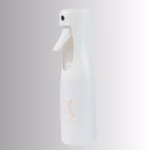 Image Description: A promotional product photo of the white continuous spray bottle from a full side angle set against a neutral gradient background, displaying the complete silhouette and brand logo.