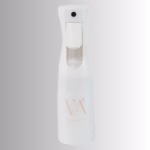Image Description: A promotional product hero image of a white continuous spray bottle set against a neutral gradient background, featuring a trigger spray handle and the "VA" logo on the body.