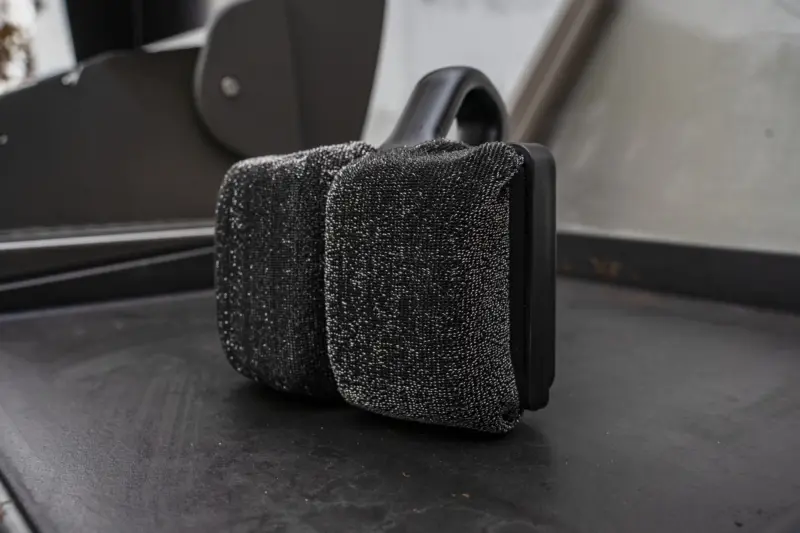 Griddle Scrubber Standing on Grill