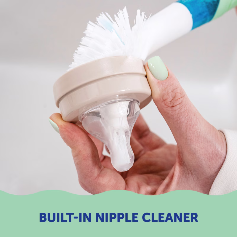 Image Description: A close-up detail photo highlighting the built-in nipple cleaner integrated into the brush head assembly.
